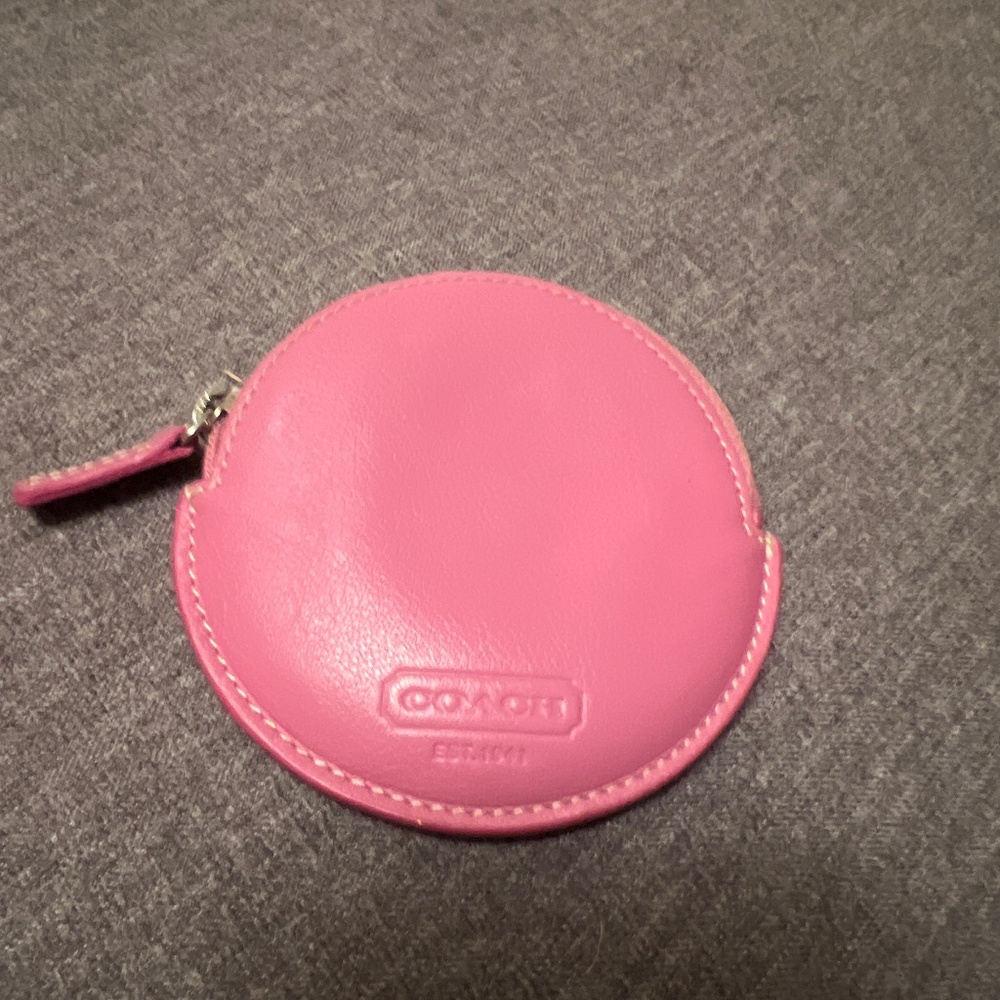 Small bright pink leather Coach change purse